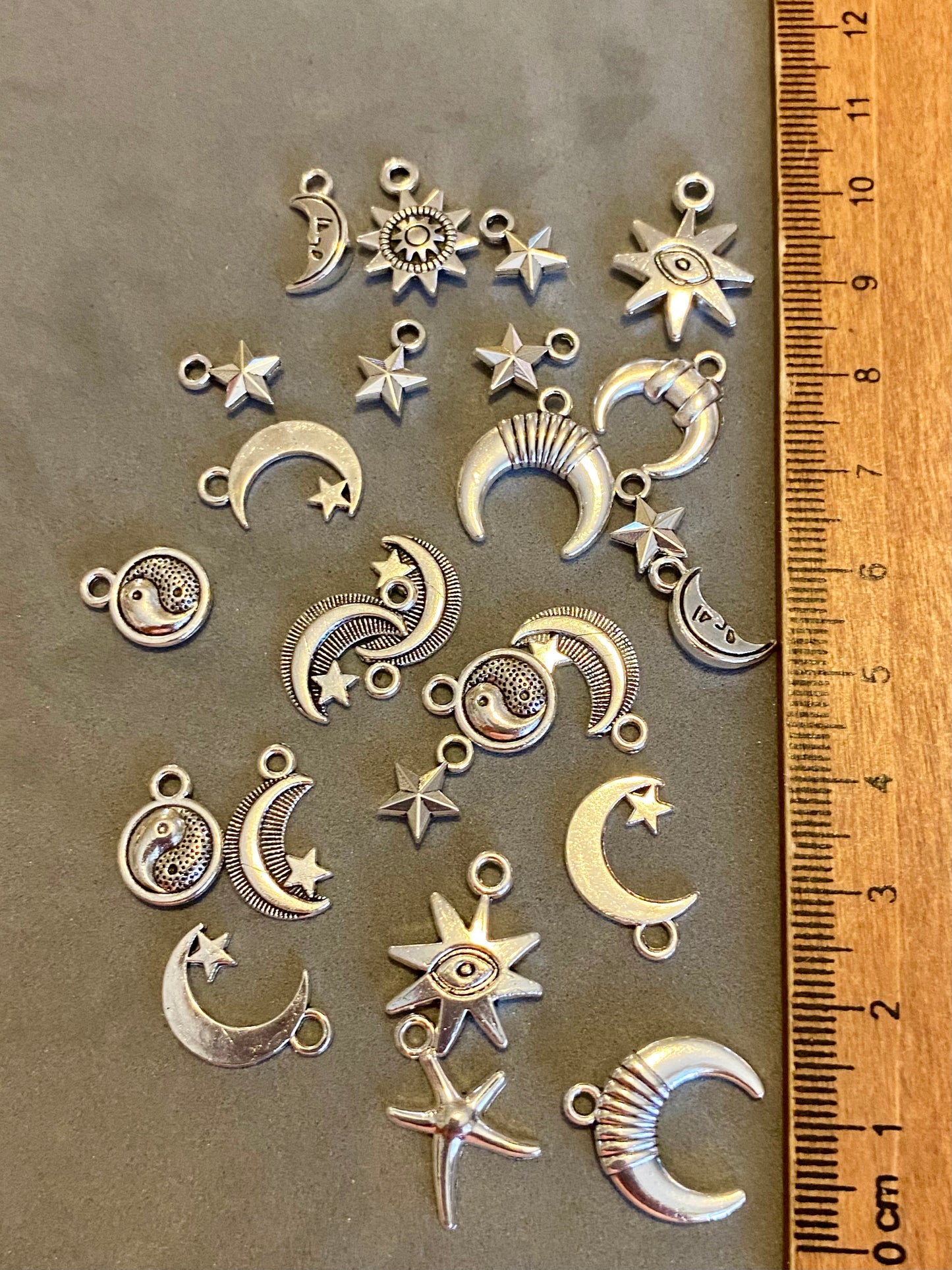 25 Assorted Silver Coloured Moon And Star charms