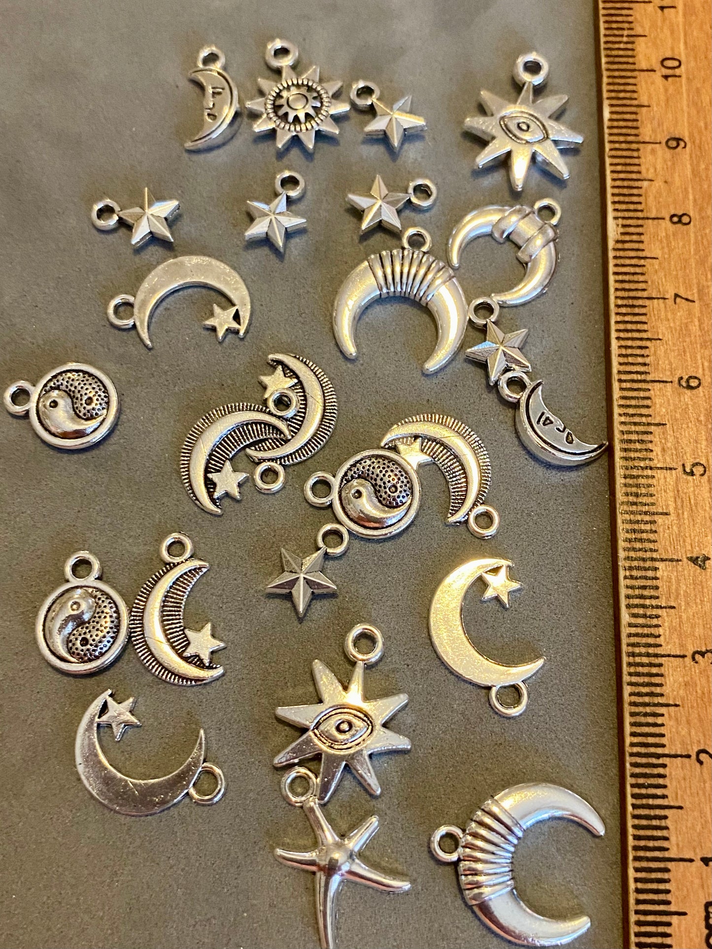 25 Assorted Silver Coloured Moon And Star charms