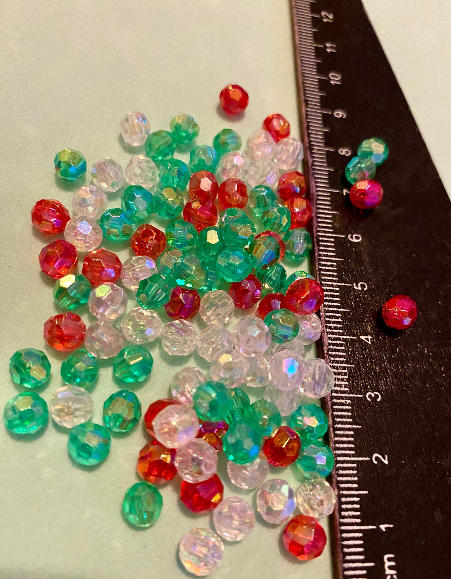 100x Multi facetted Green Clear and Red 6mm Beads