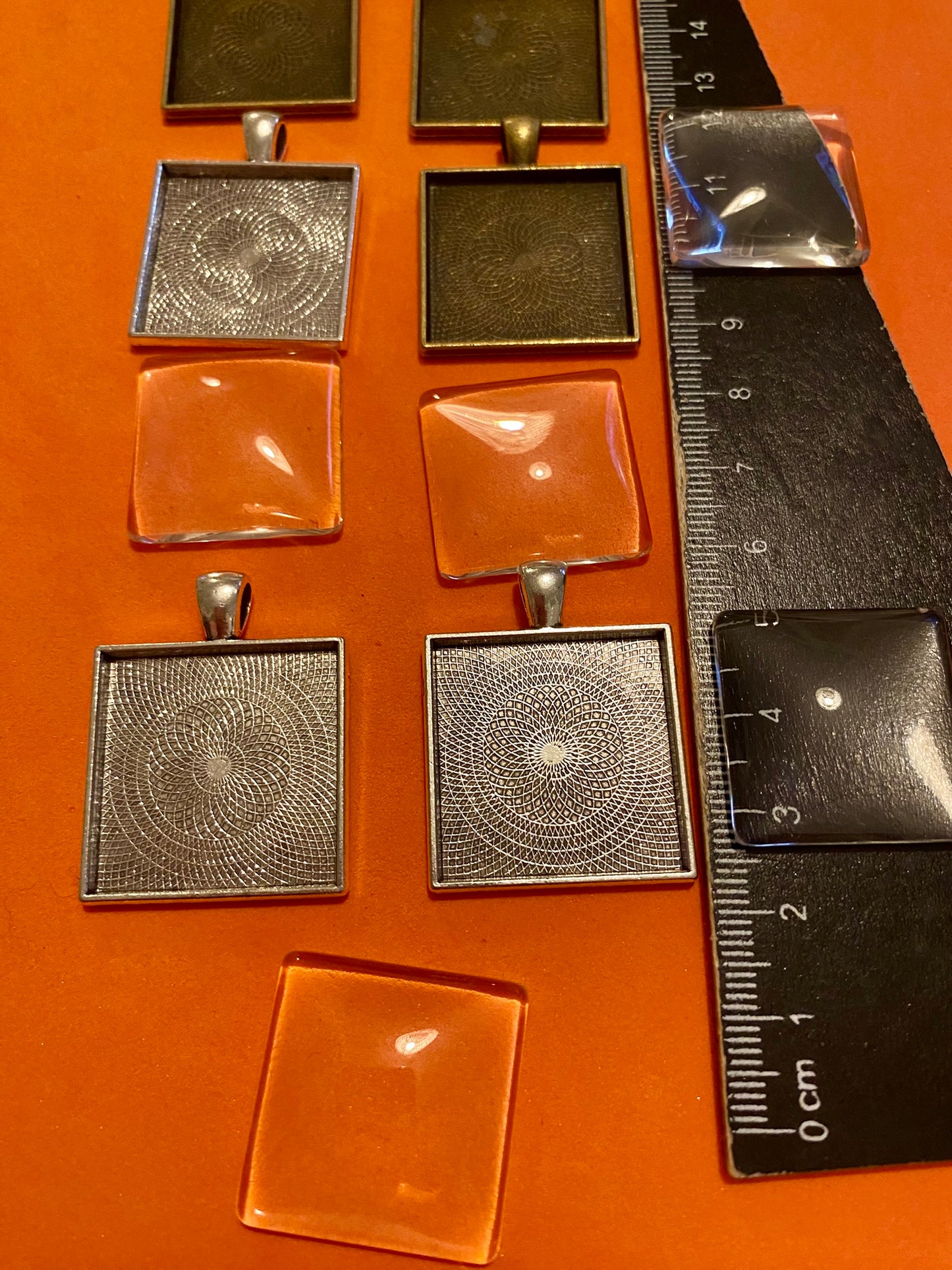 Six Square Silver and Bronze Pendants with Glass Doomed Cabachons