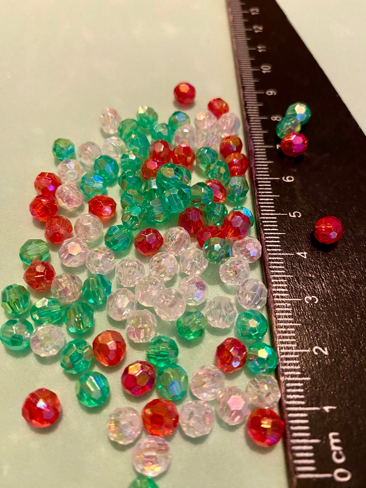 100x Multi facetted Green Clear and Red 6mm Beads