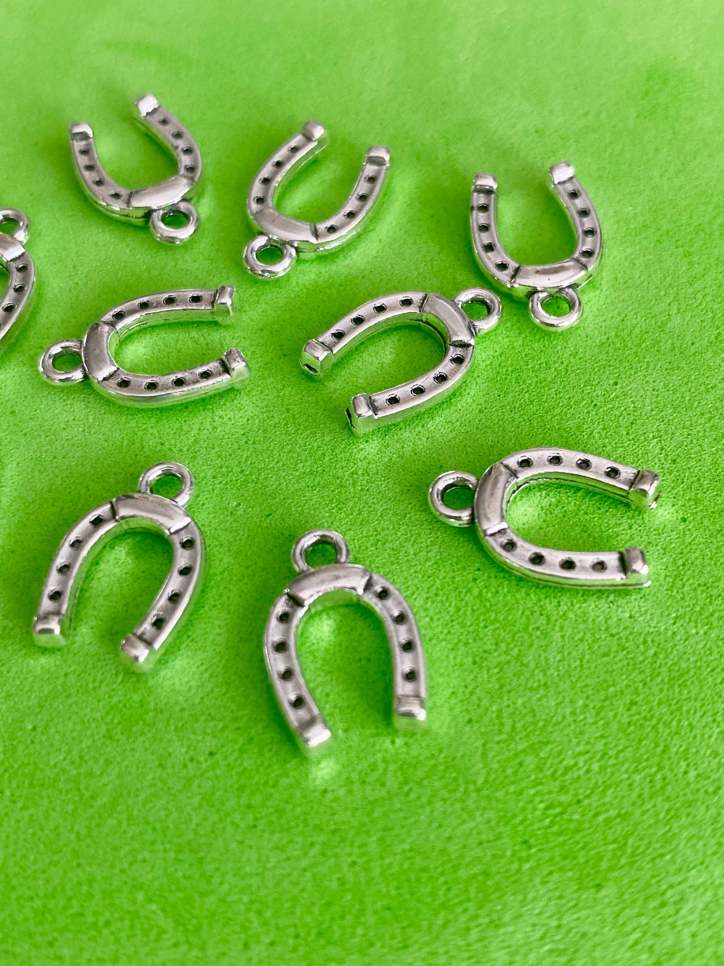 10 Silver Coloured Horse Shoe Charms 13mm