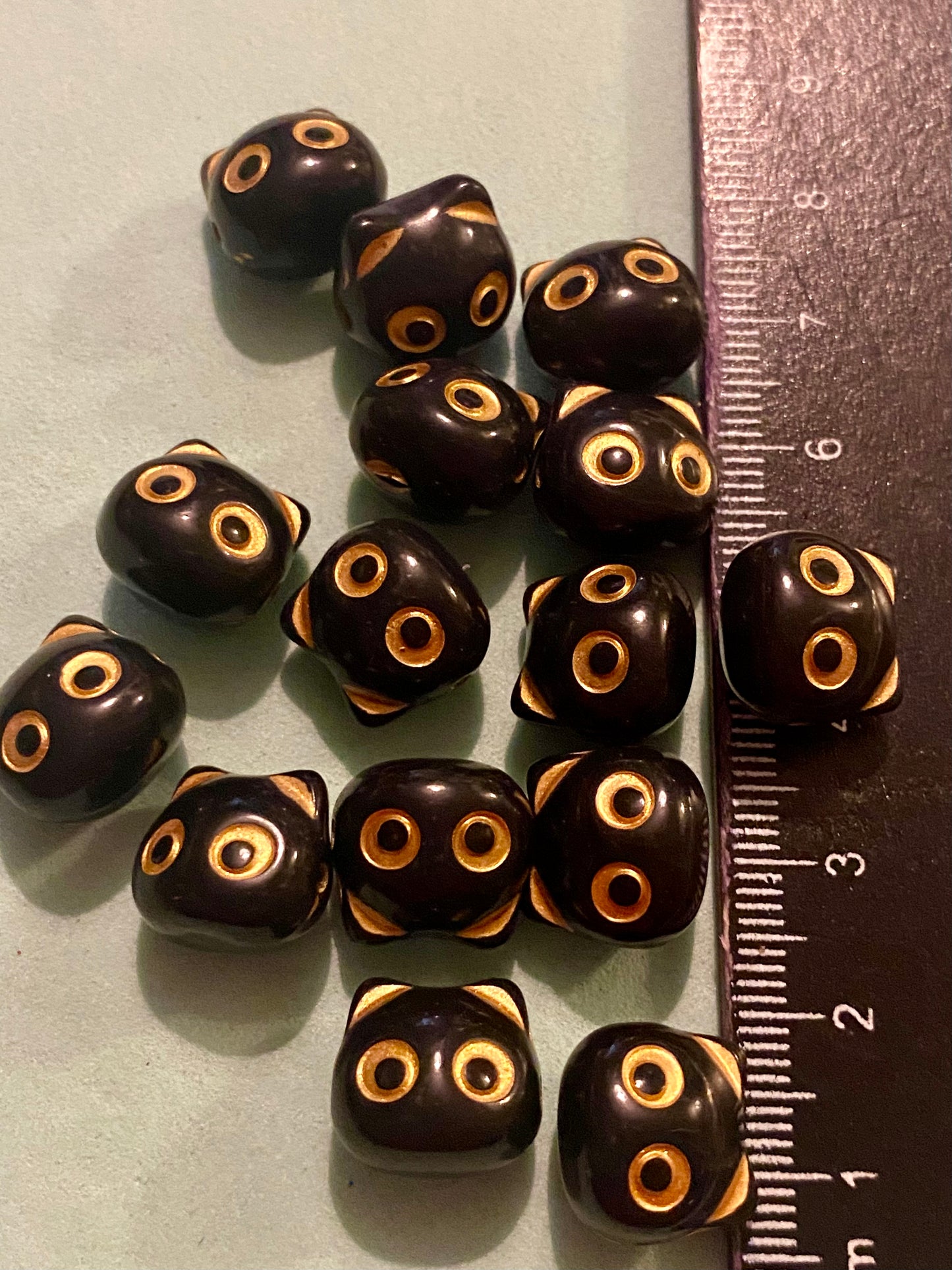 15 Black and Gold Cat Head Beads suitable for jewellery and crafting