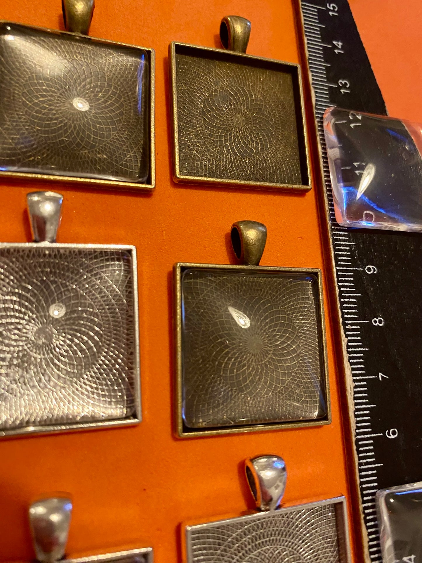 Six Square Silver and Bronze Pendants with Glass Doomed Cabachons