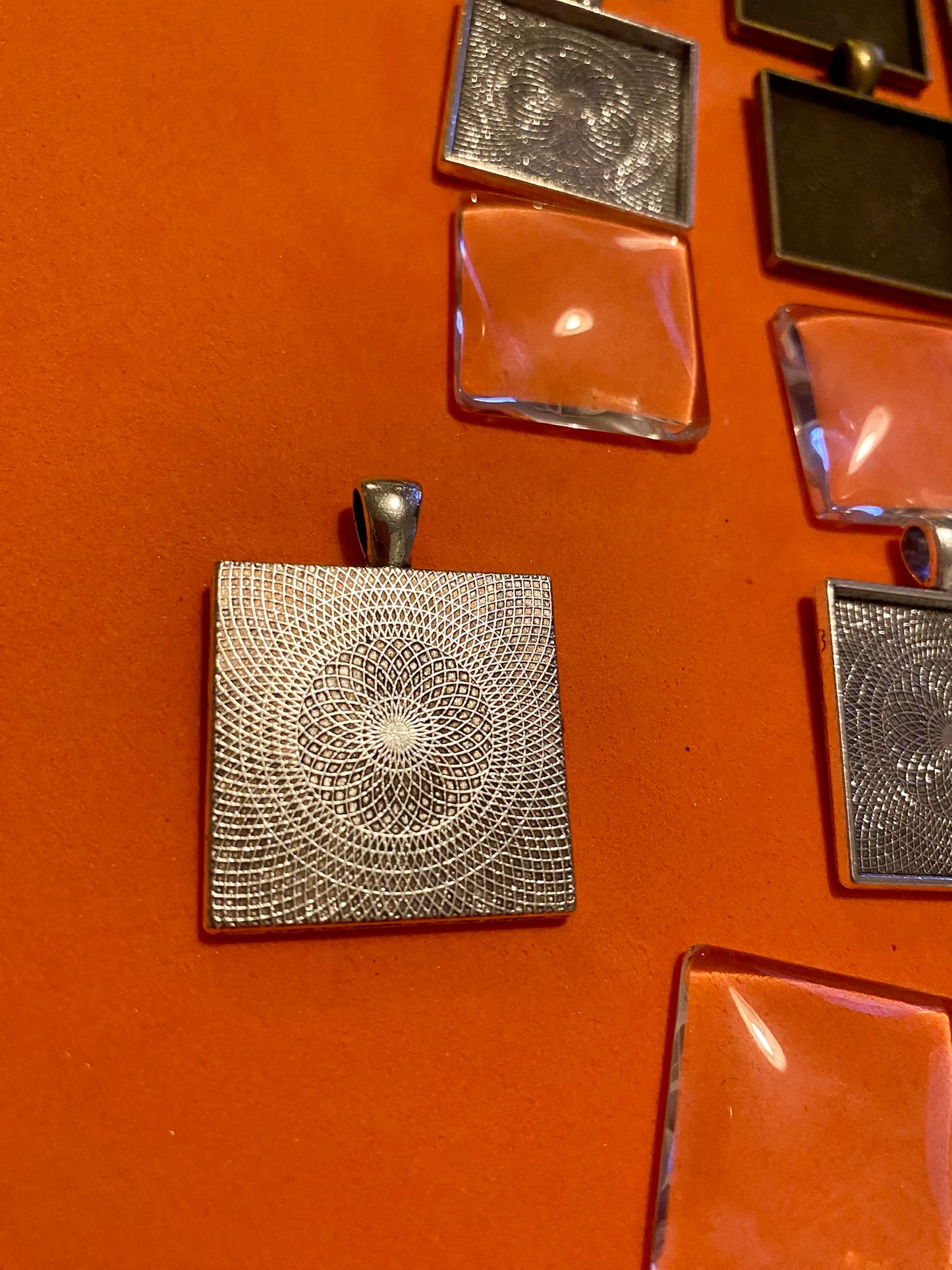 Six Square Silver and Bronze Pendants with Glass Doomed Cabachons