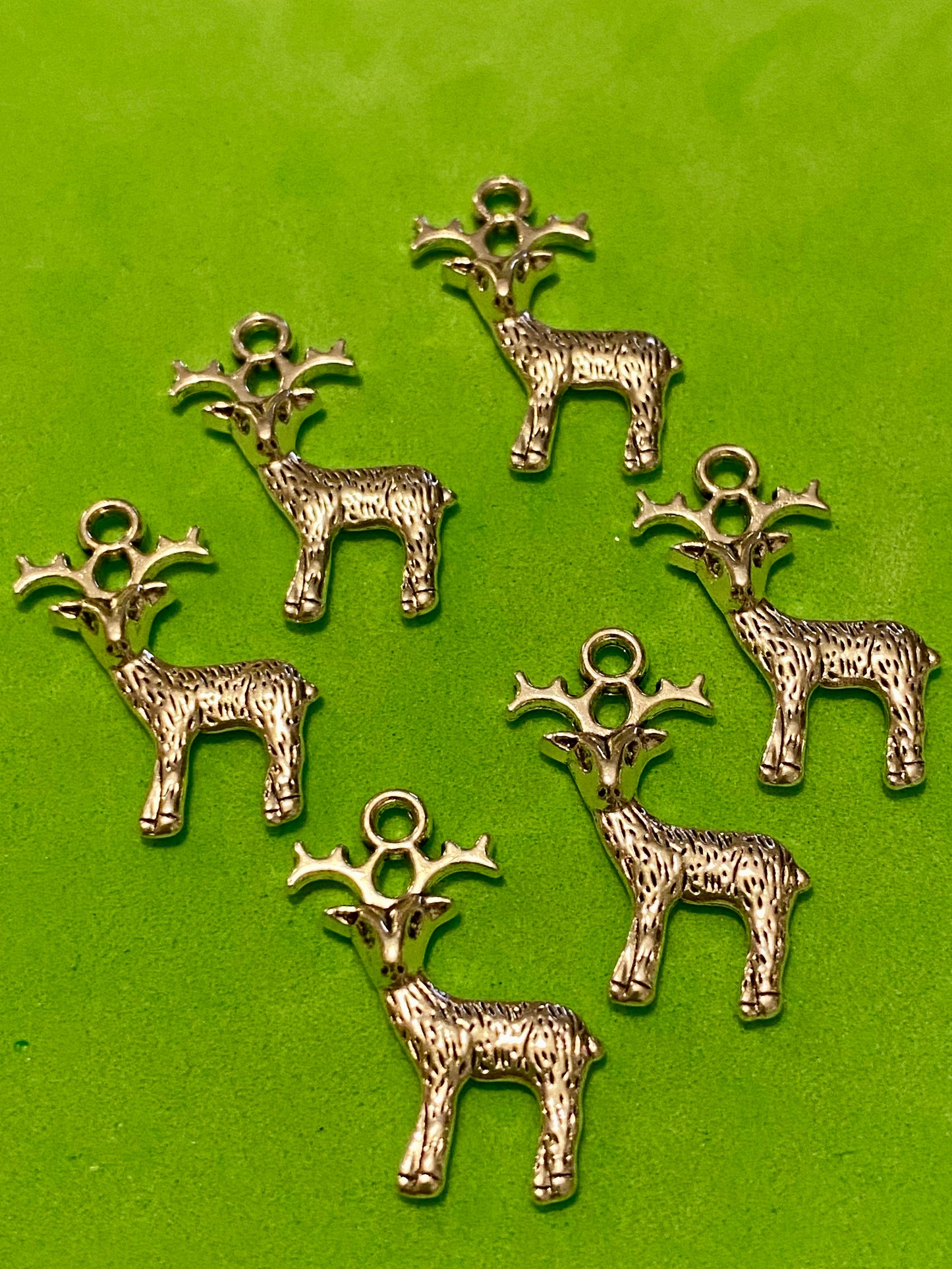 6 Silver coloured Reindeer Charms 24mm by 12mm