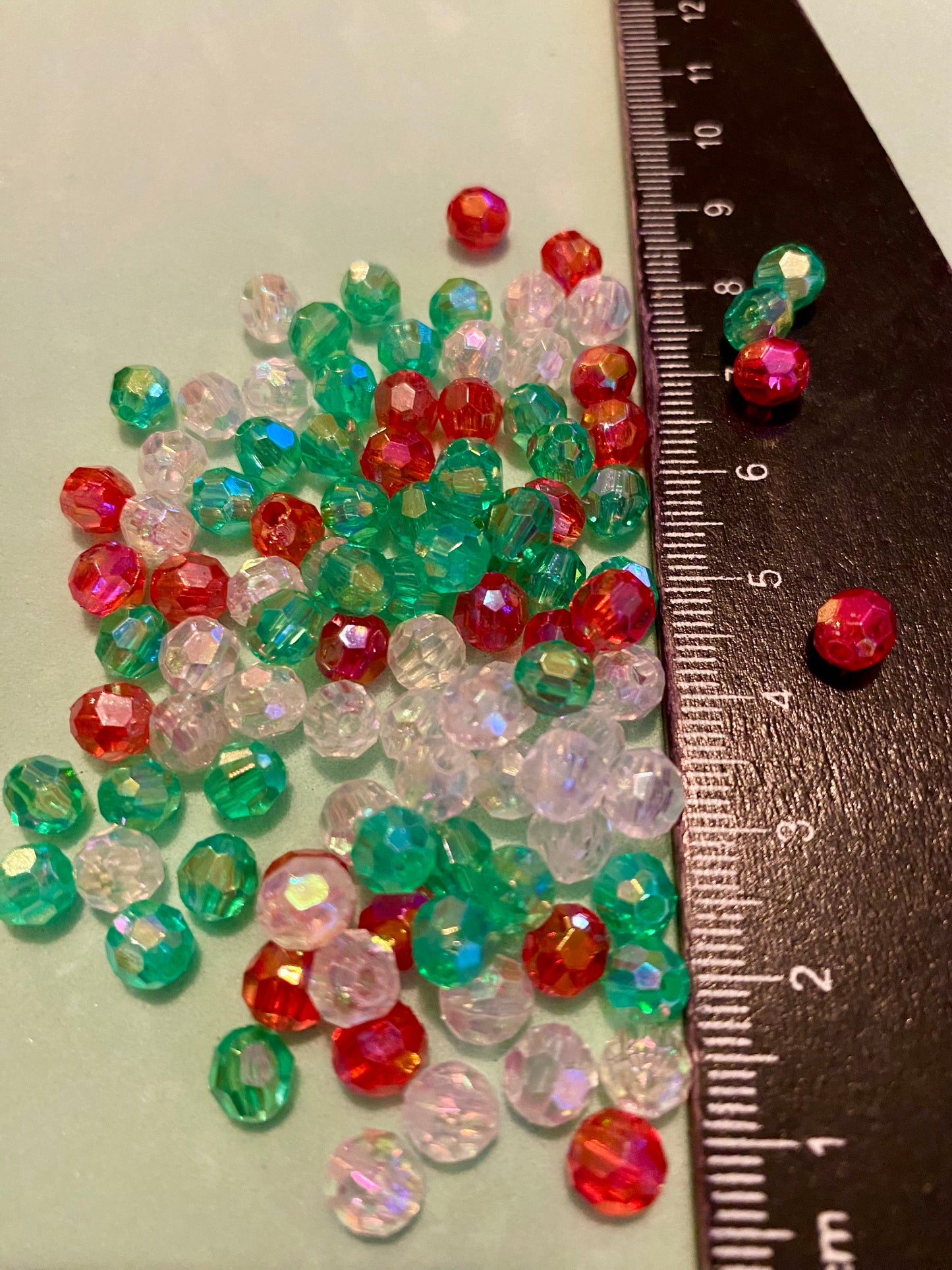 100x Multi facetted Green Clear and Red 6mm Beads