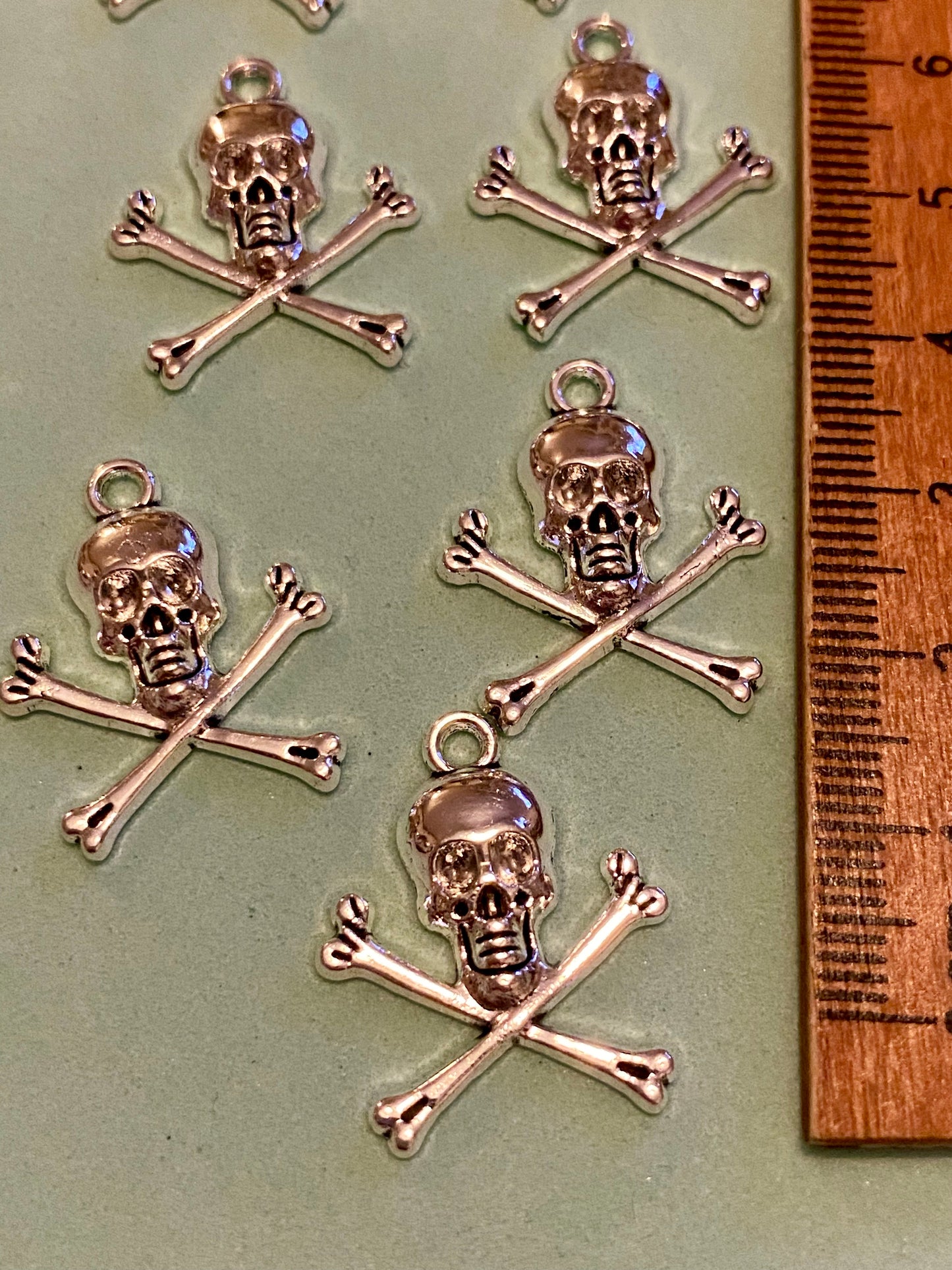 7 X Skull and Crossbones Charms 23mm