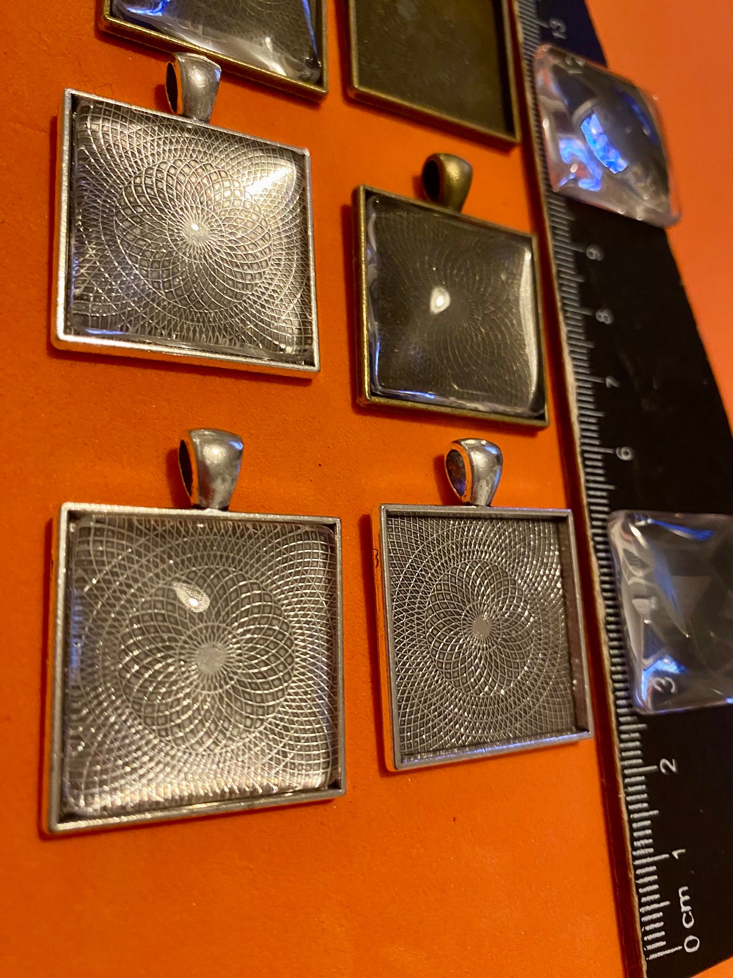 Six Square Silver and Bronze Pendants with Glass Doomed Cabachons