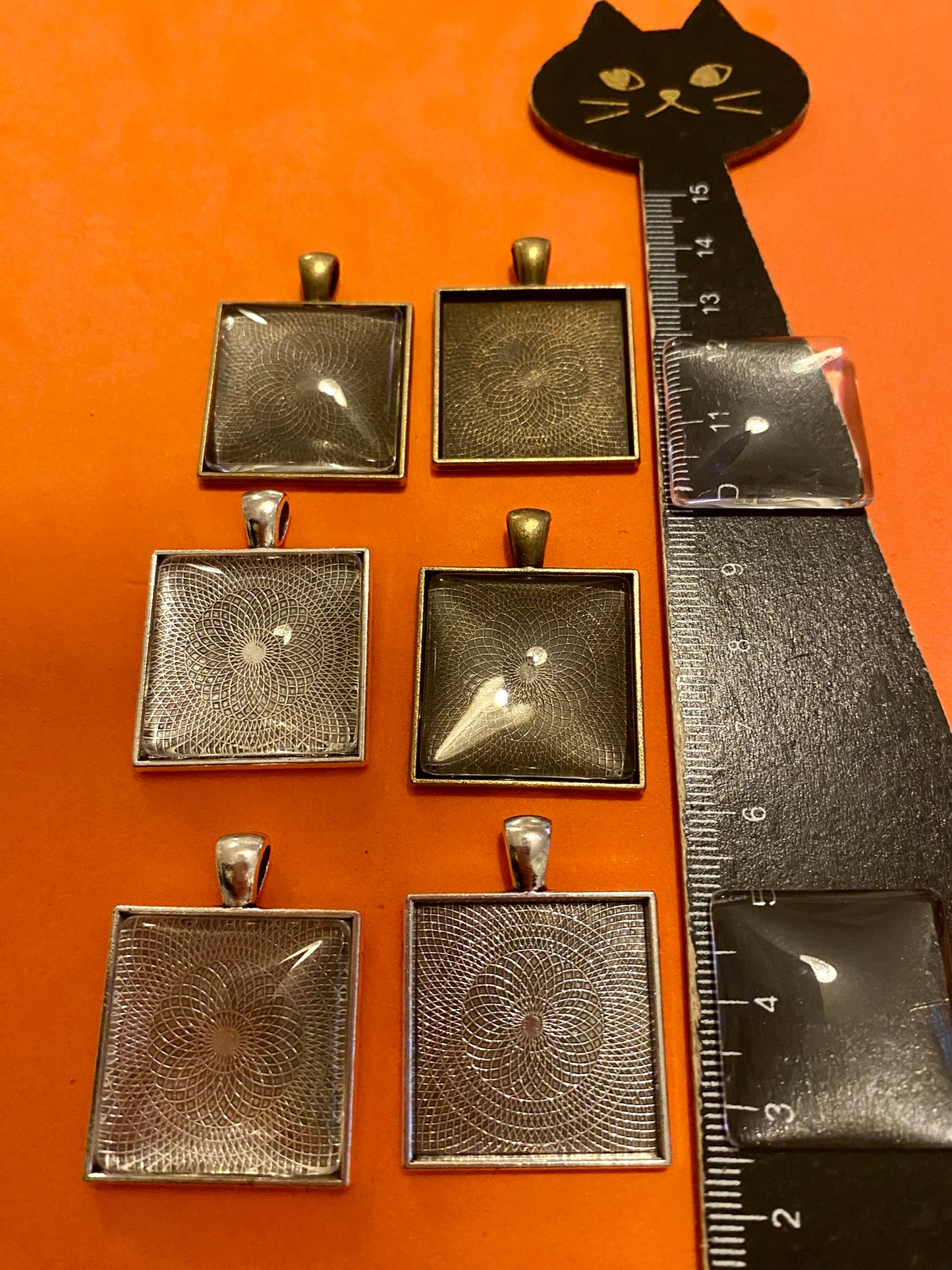 Six Square Silver and Bronze Pendants with Glass Doomed Cabachons